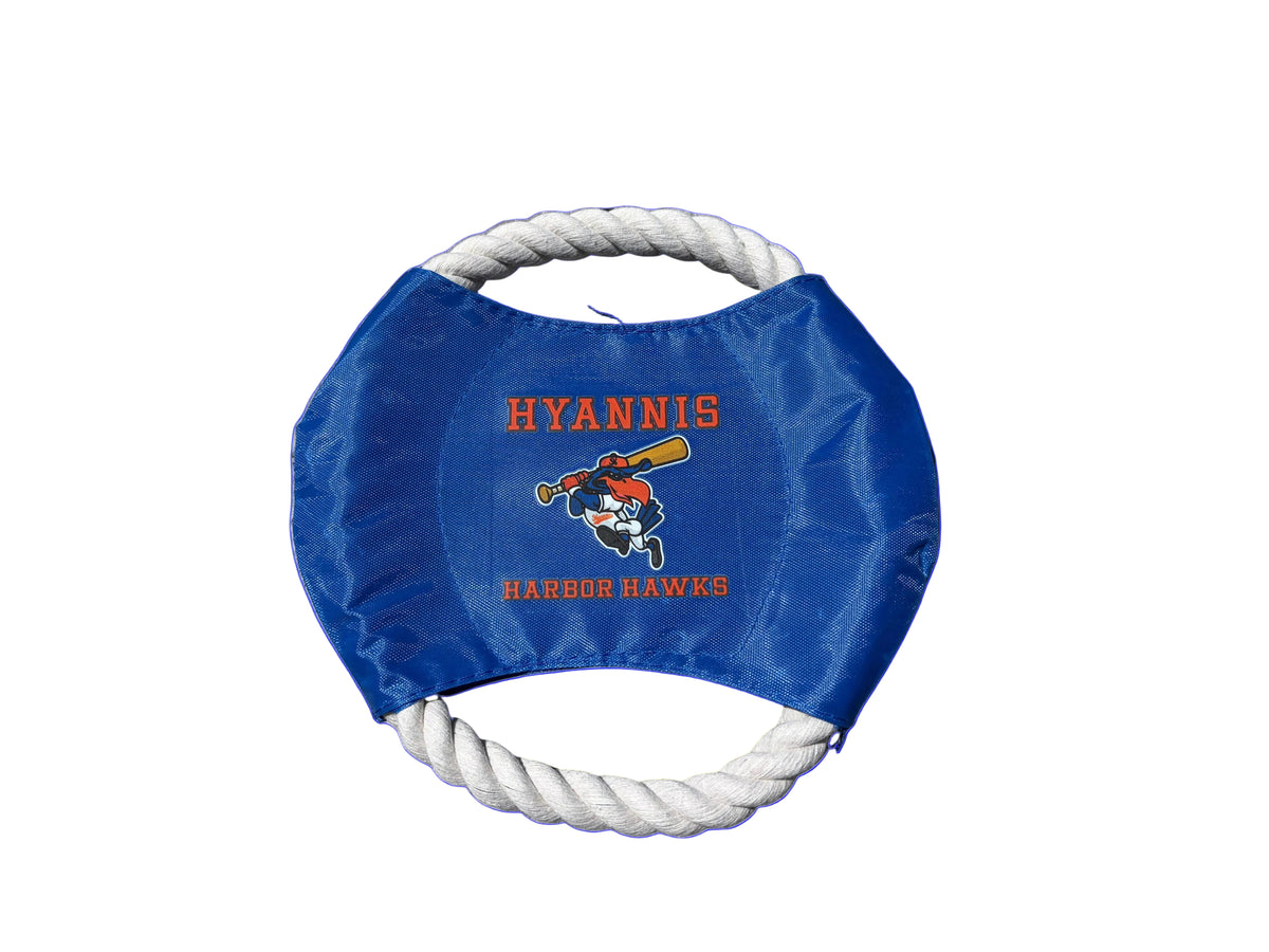 Blue frisbee with white rope handle and 'Hyannis Harbor Hawks' logo on a wooden surface